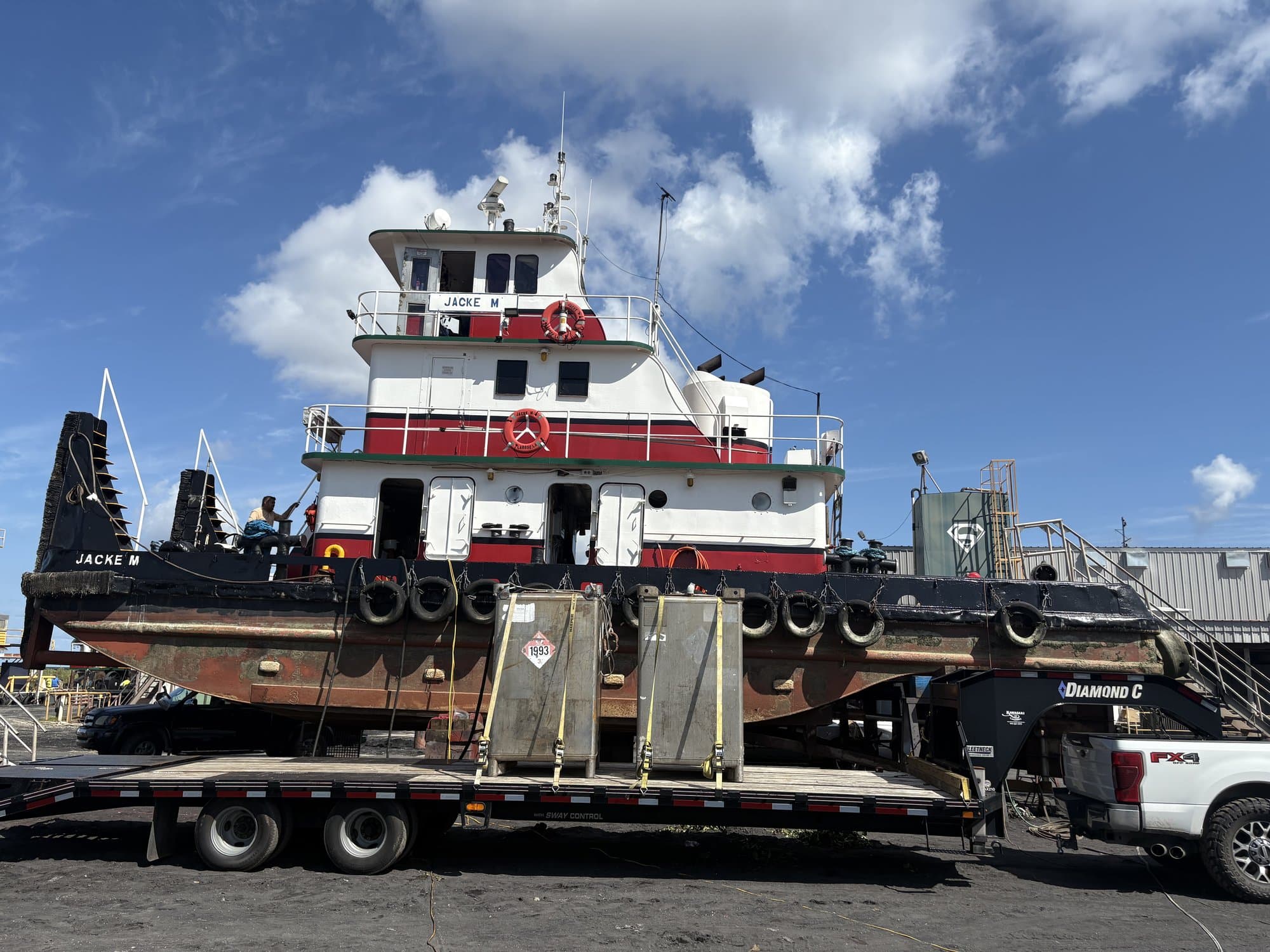 Melancon Marine tugboat in transport on a lowboy trailer in South Louisiana