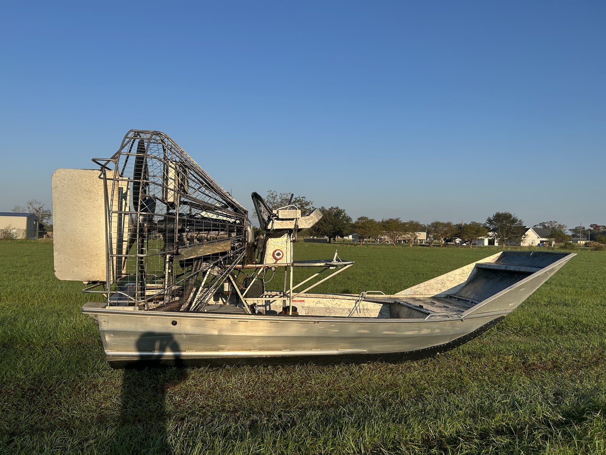 Working airboat staged on the grass in Larose Louisiana
